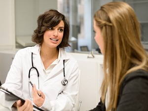 woman consulting doctor